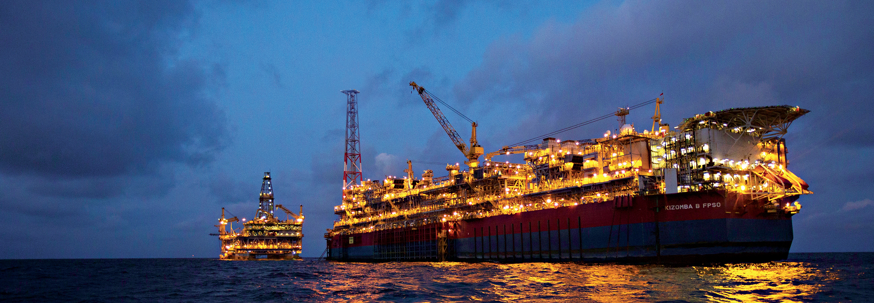 The Kizomba B FPSO and tension-leg platform at night