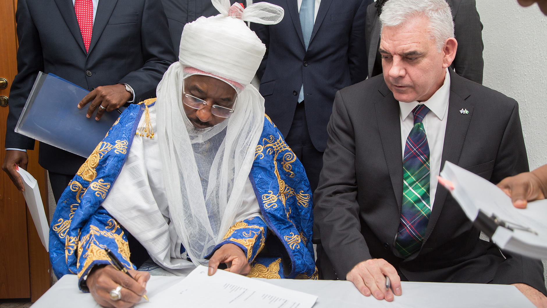 Muhammadu Sanusi II and Paul McGrath at the QIPP Signing Ceremony.
