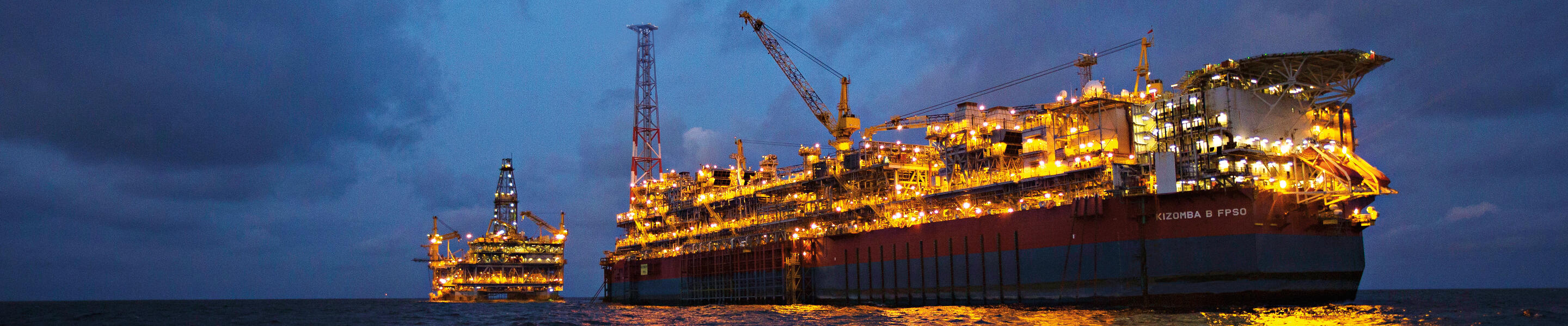 The Kizomba B FPSO and tension-leg platform at night