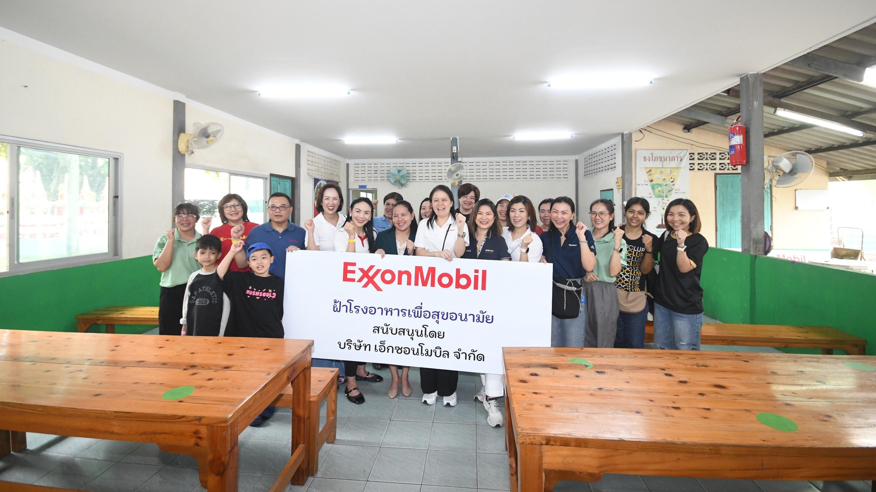 ExxonMobil management presented the newly installed cafeteria ceiling.