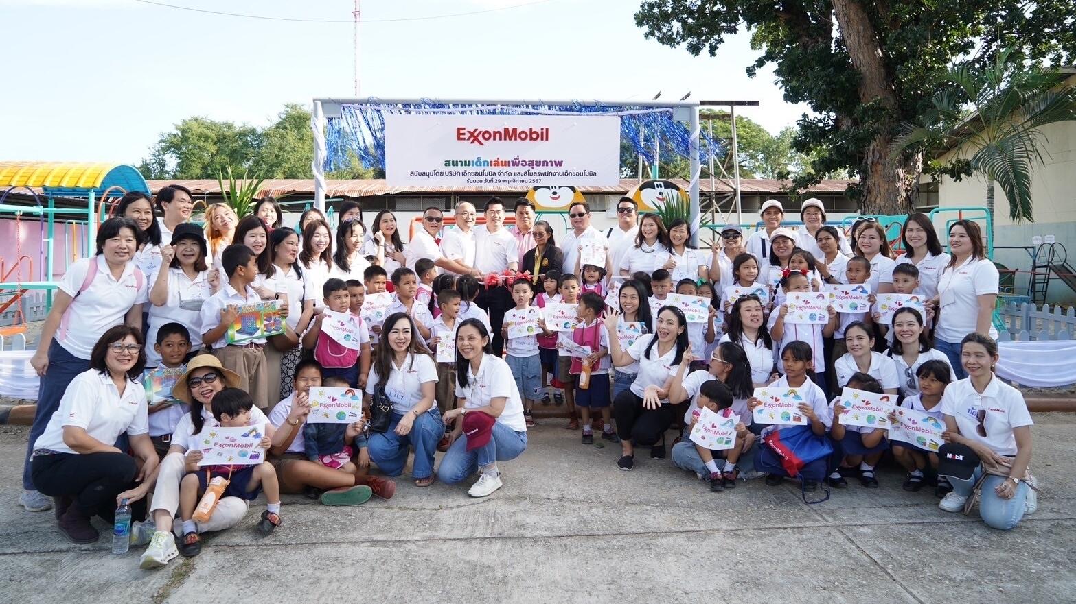 group of employee volunteers in Kanchanaburi province with local students
