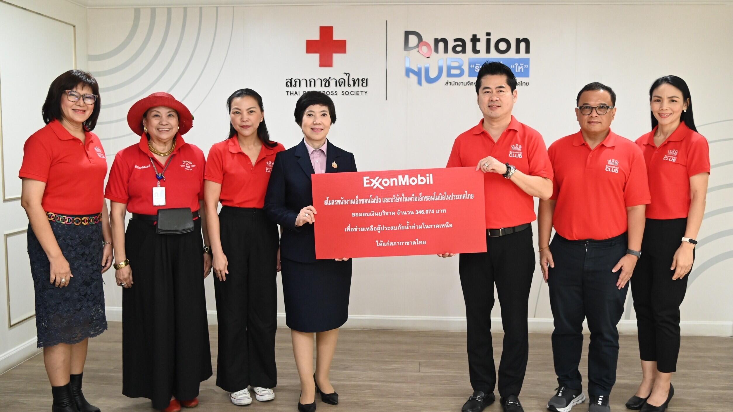 presenting donation to Thai Red Cross Society