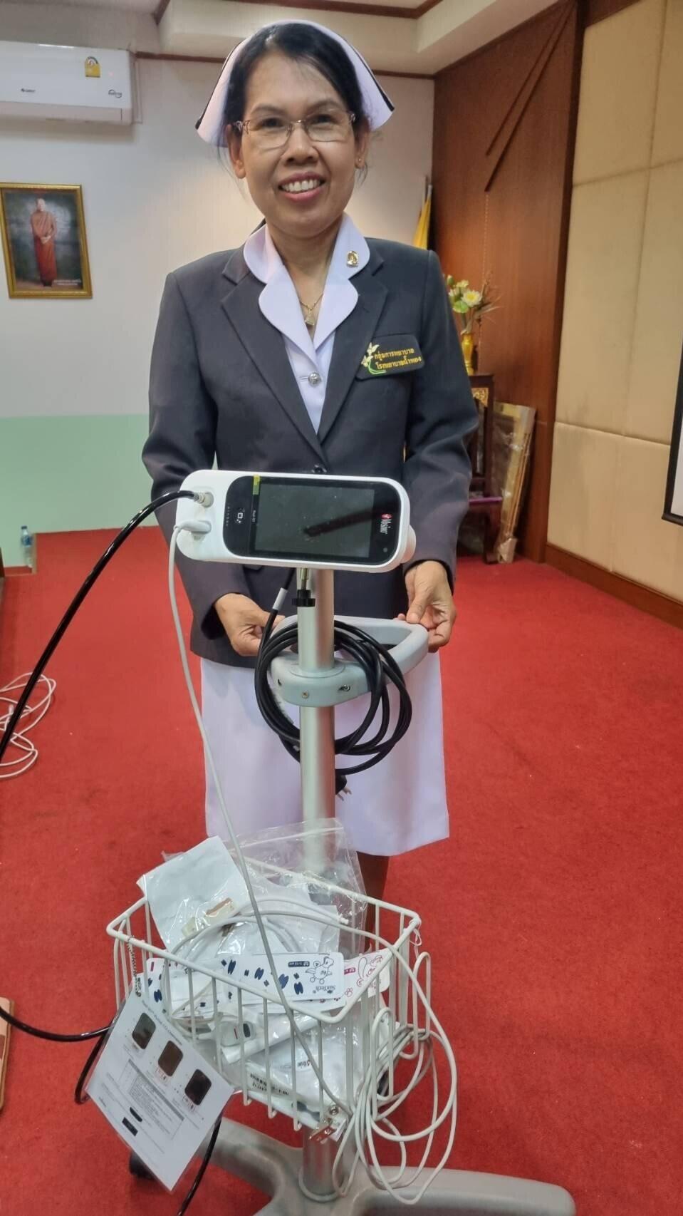 Namphong Hospital nurse shows new equipment funded by ExxonMobil Thailand