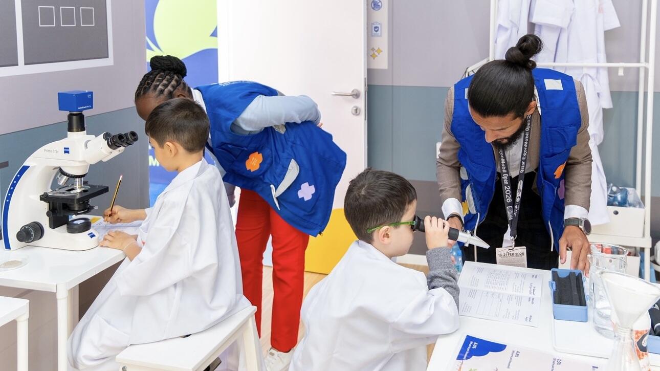 Tennis star Pierre Hugues Herbert visits the ExxonMobil Qatar booth, joining his children as they participate in the mangrove themed educational activities