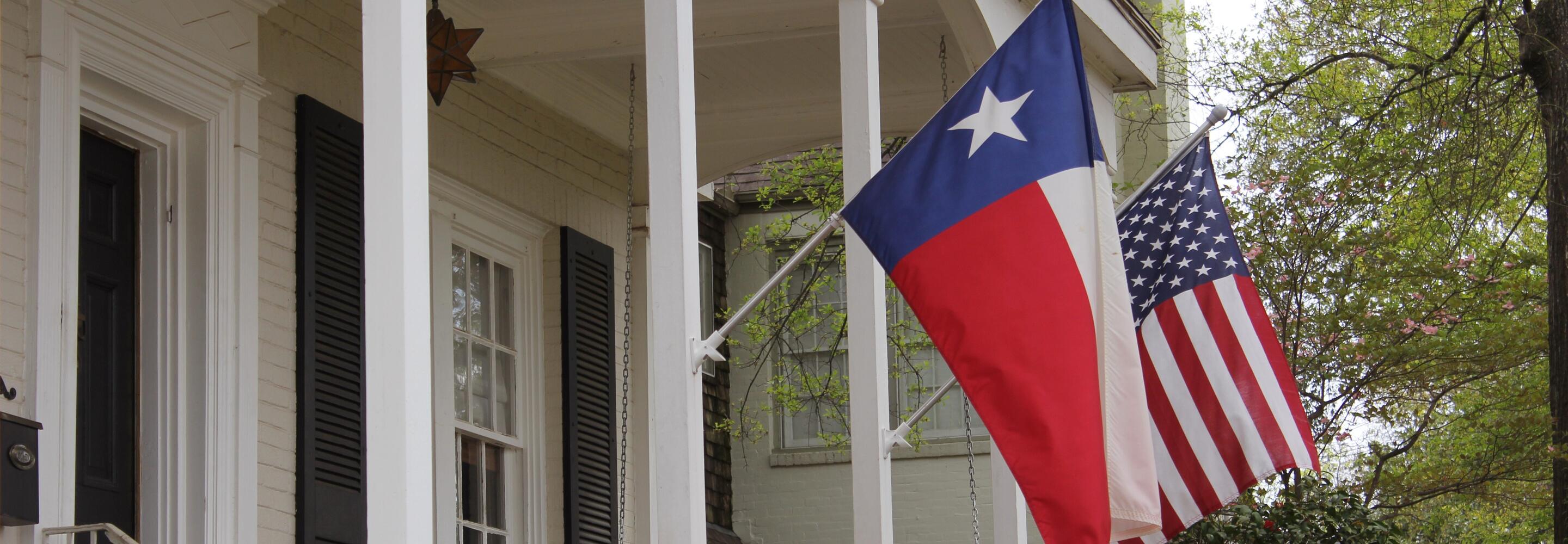 flags on a front porch