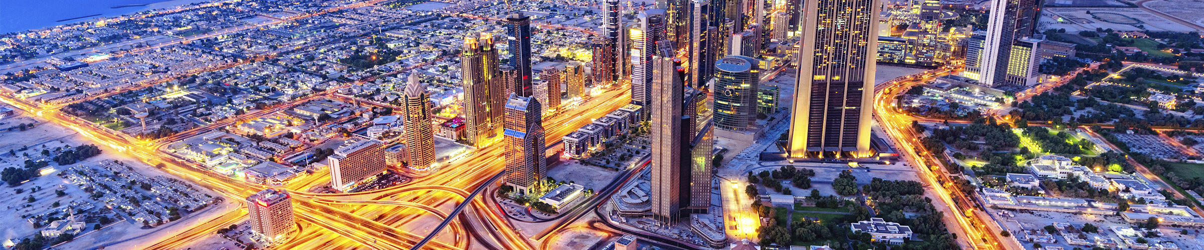 Aerial view on Dubai and the famous Sheikh Zayed Road at dusk