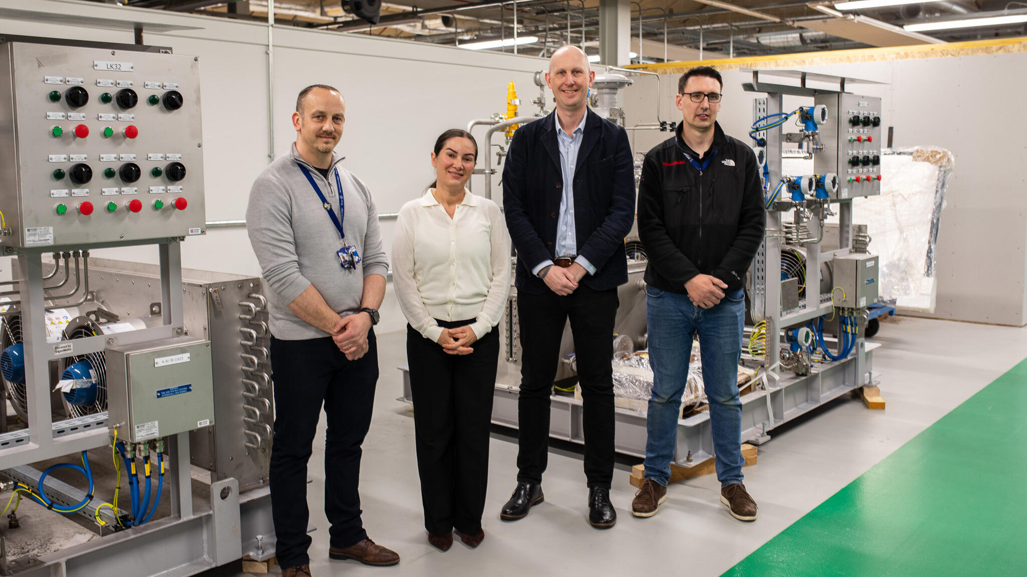 Group poses at ExxonMobil Fife facility as donation of equipment and tools made to Fife College