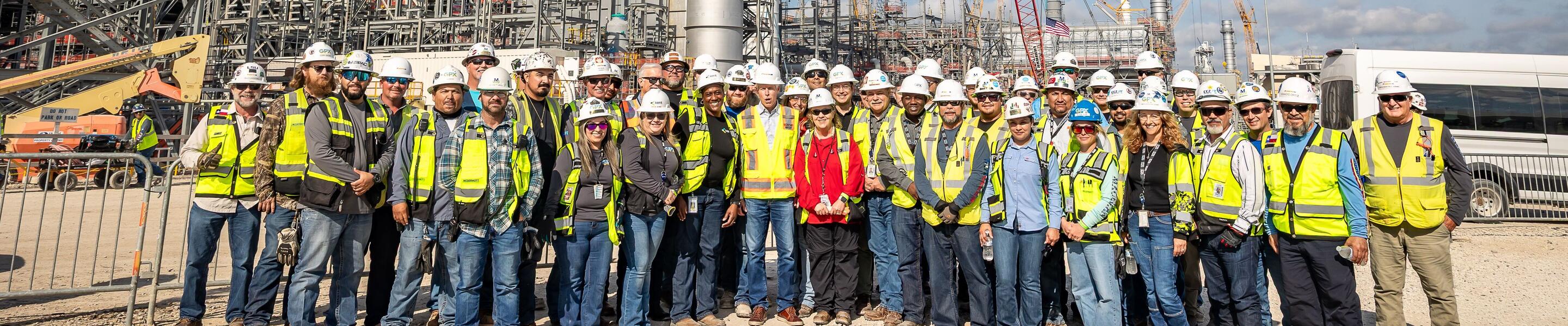 DOE Secretary Chris Wright tours Golden Pass LNG terminal with a group of workers