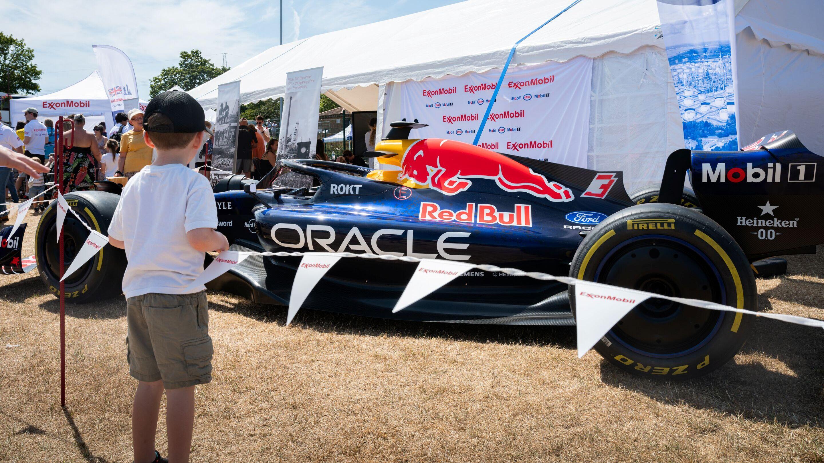 young boy viewing Mobil 1race car at the Six Villages Together Festival, sponsored by ExxonMobil Fawley