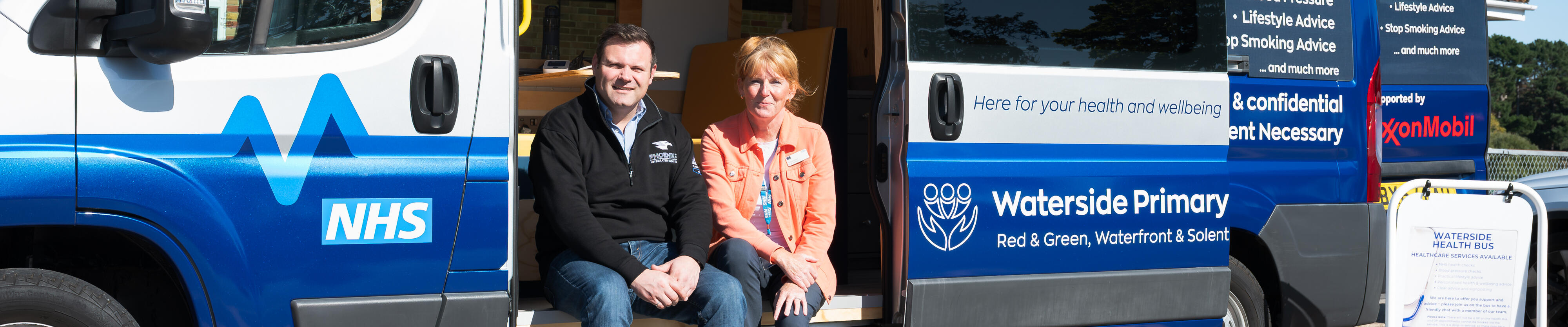 ExxonMobil Fawley's Joel Mizen and Waterside's Yvonne Sayers sitting in mobile health unit