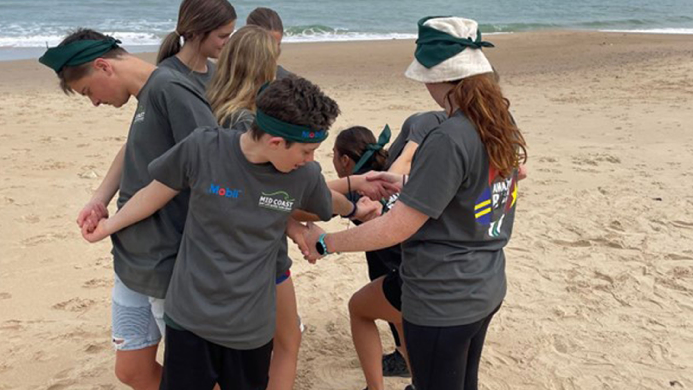 Image Youth members participating in an activity during Mid Coasts Amazing Race event.