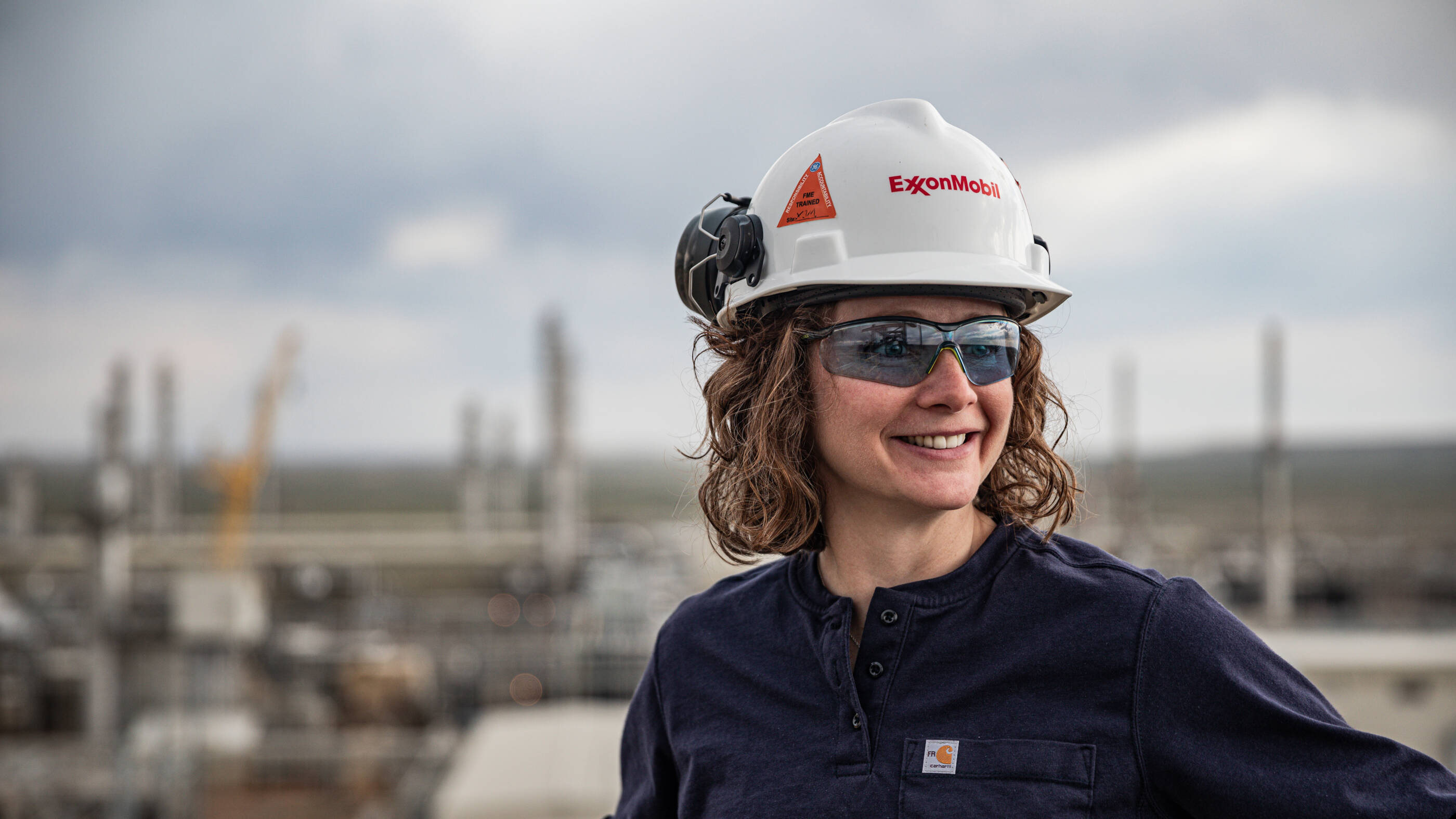 Employee working at a refinery