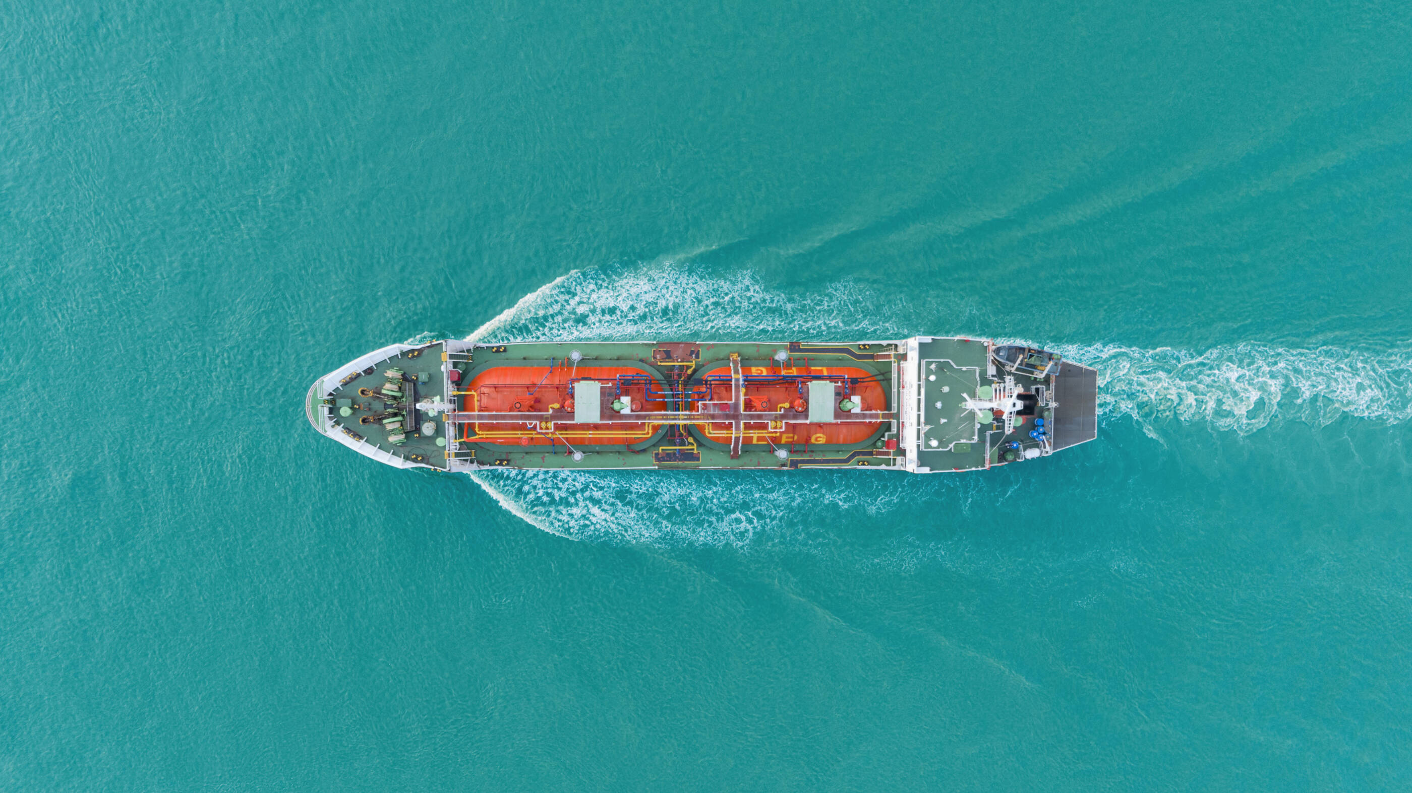 Aerial top view Oil or LPG ship tanker transportation oil/gas from refinery on the sea