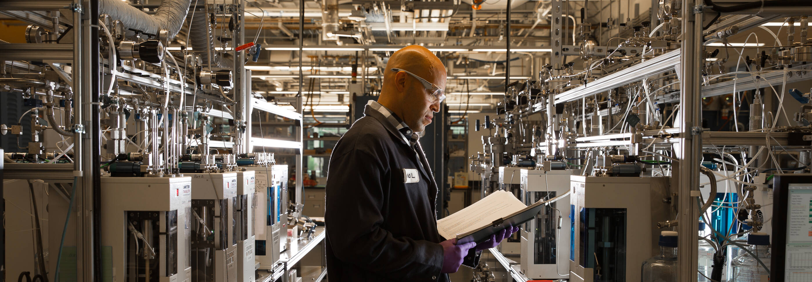 Man in lab wearing safety goggles