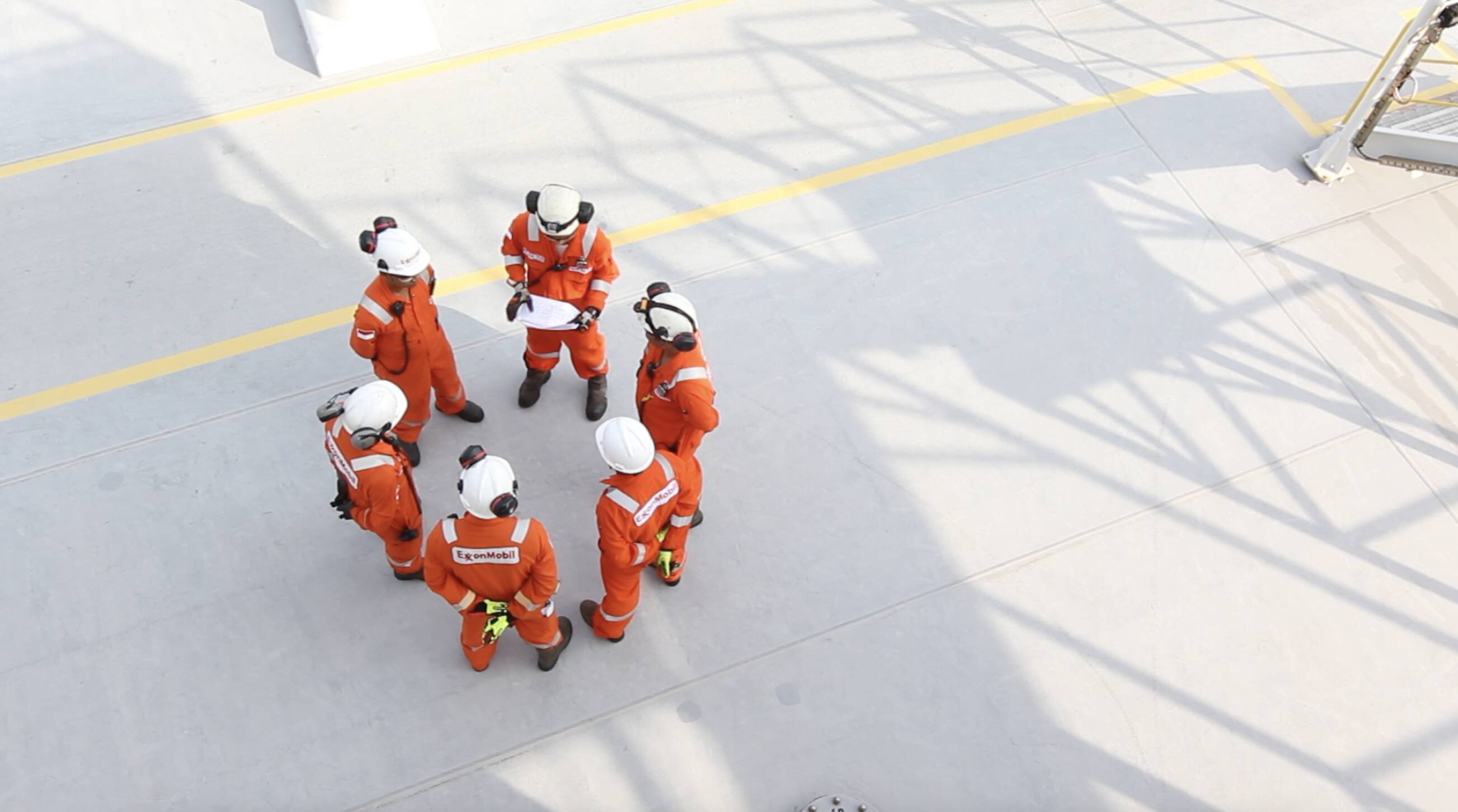 ExxonMobil employees working
