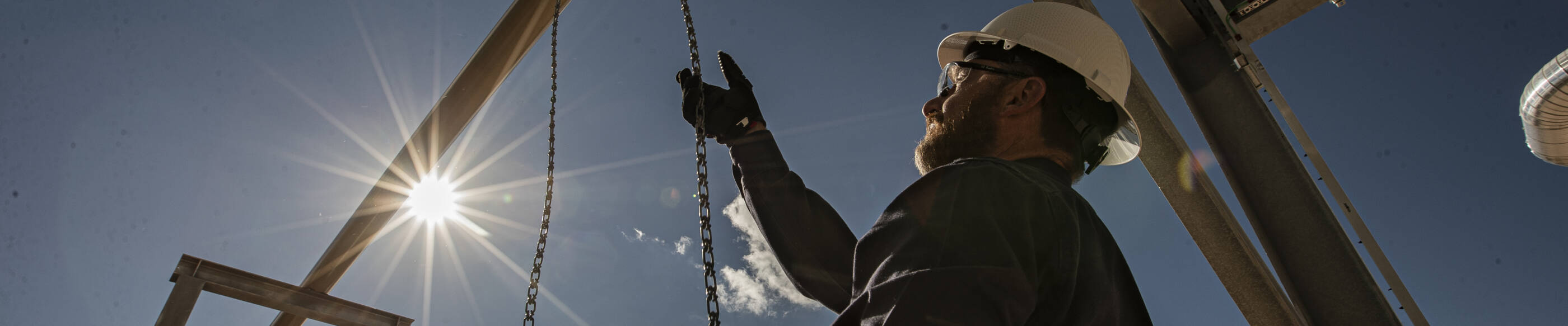 ExxonMobil employee pulling chain at facility in New Mexico