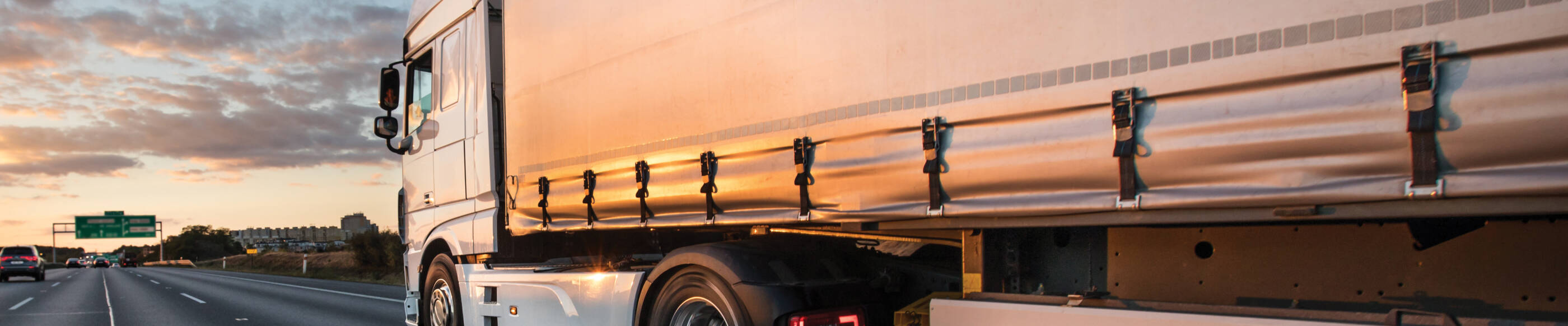 Semi truck driving on the road