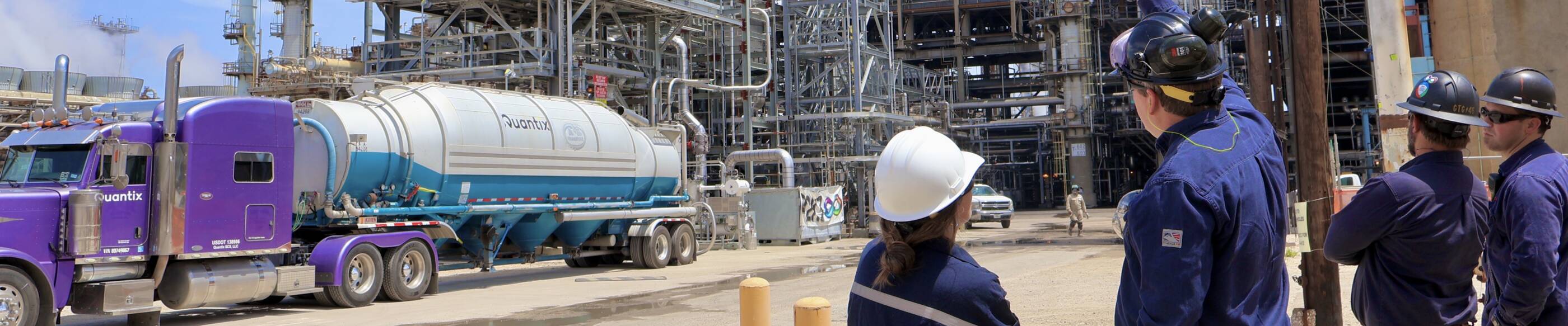 ExxonMobil employees working at a refinery
