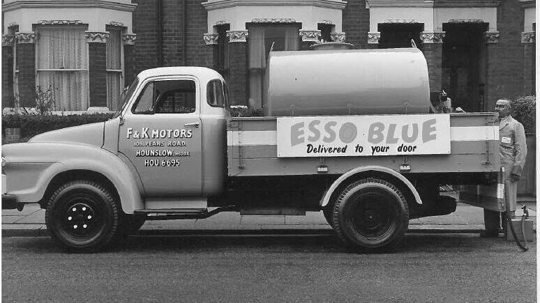 Image 1957  This truck (equipped with a metering device and ticket printer) was used to deliver Esso Blue kerosene to householders in London.