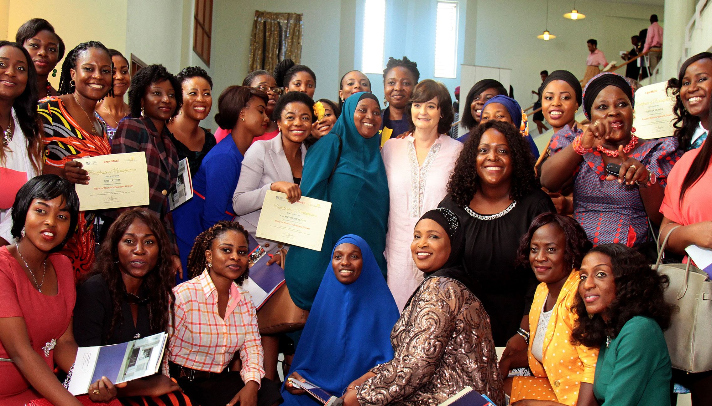 A group of women attend an event sponsored by the Cherie Blair Foundation for Women and ExxonMobil