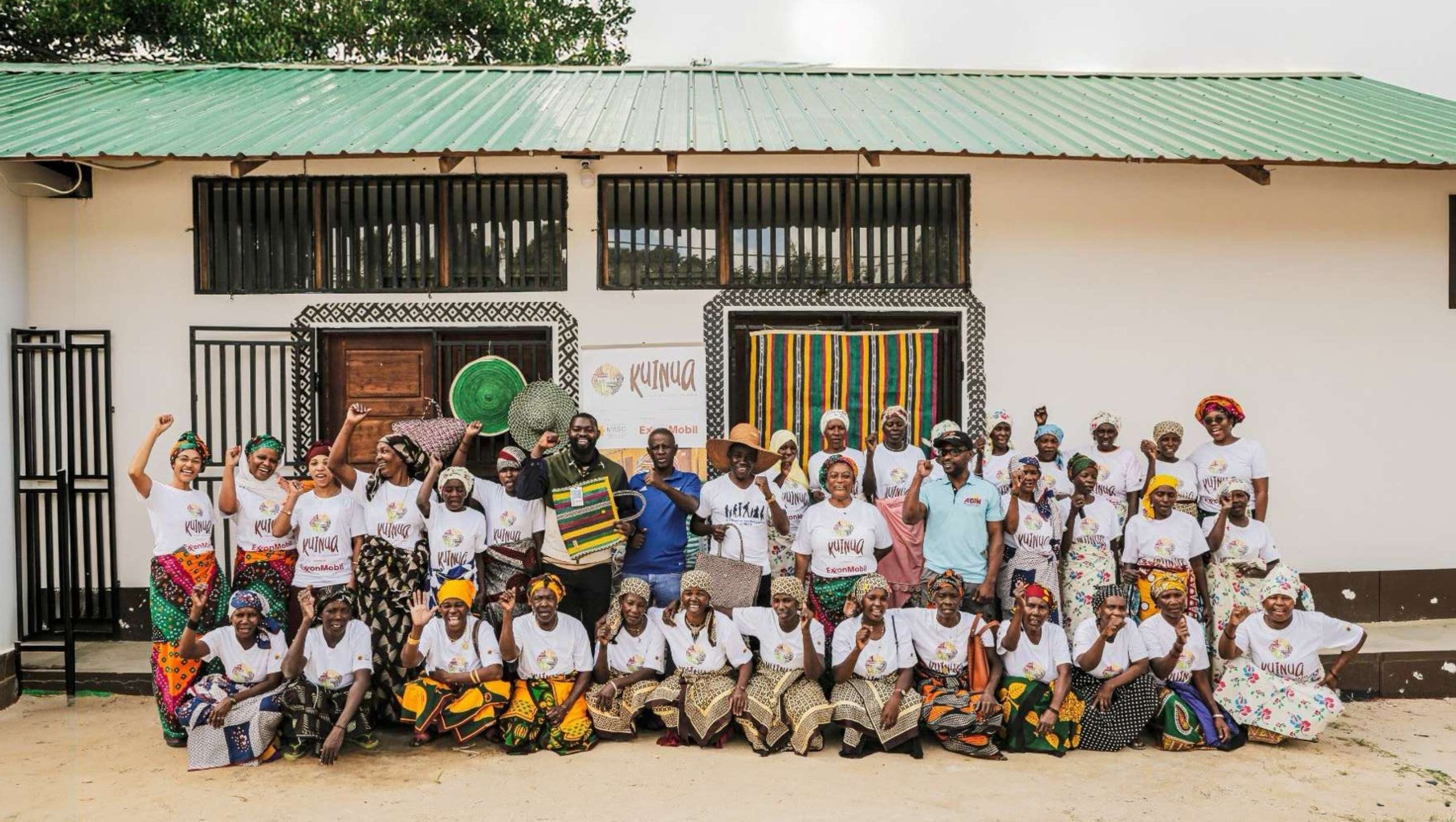 group of Mozambicans standing in front of a building