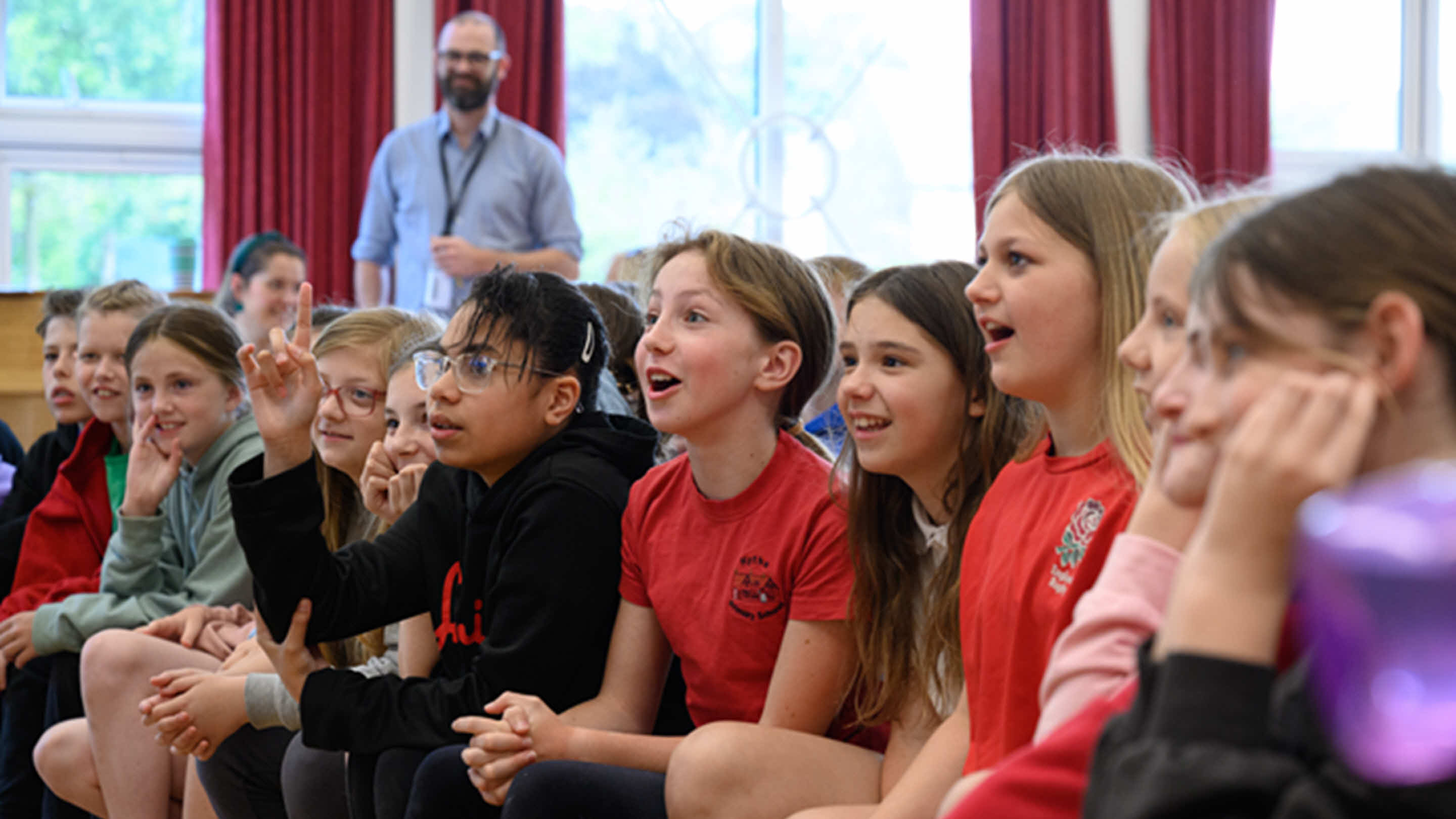 young students learning first aid