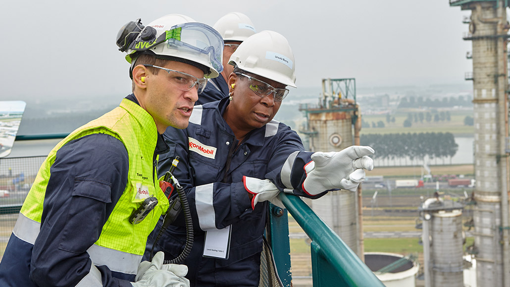 Board of Directors member in safety gear on refinery tour