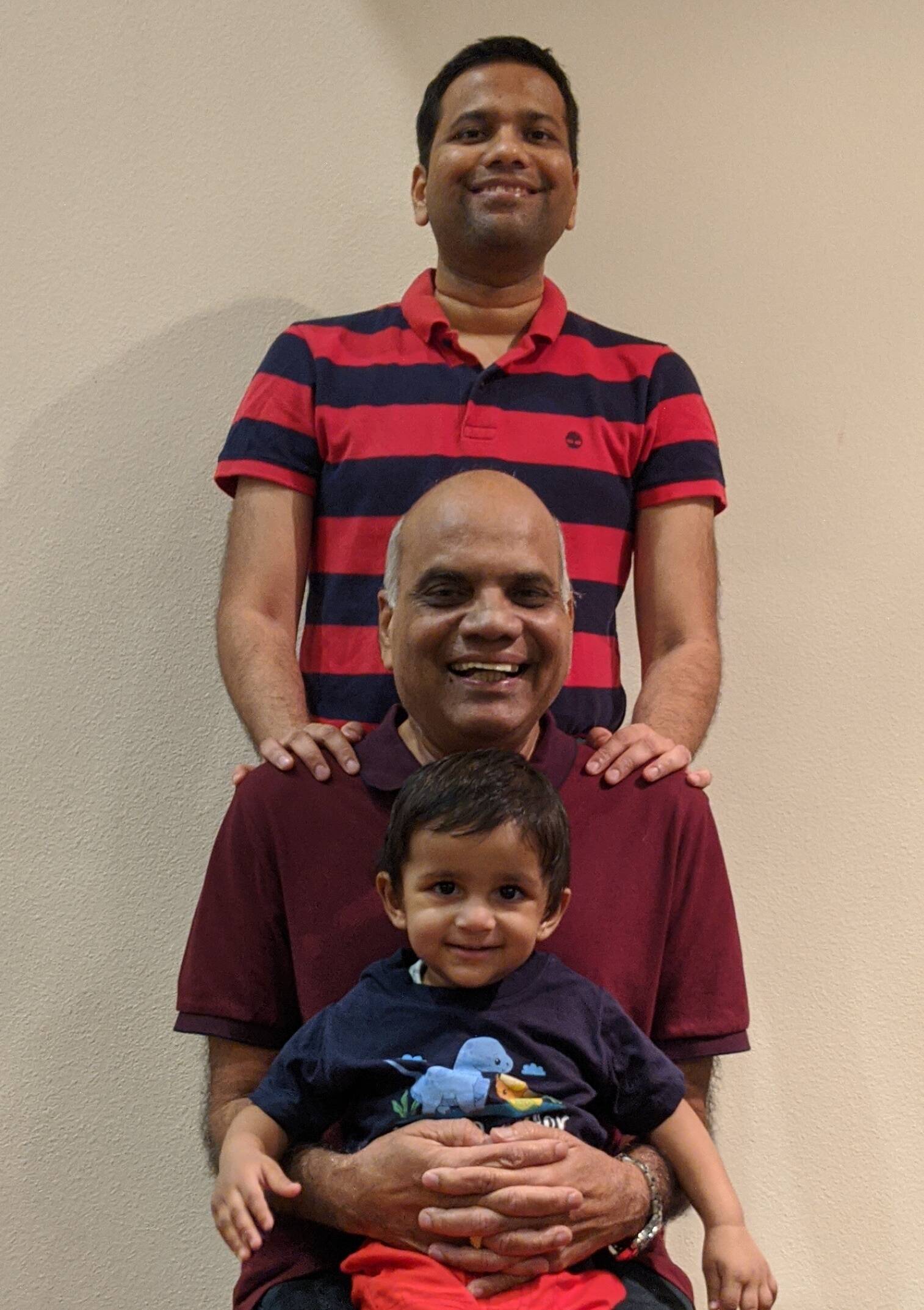 Image A happy moment early 2020 celebrating my father’s birthday in Houston. My father holds my younger son and I stand behind him – three generations.